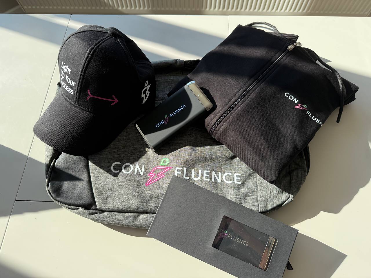 Confluence caps and bag