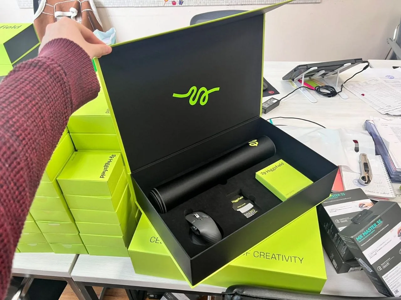 Open Higgsfield gift box with work accessories