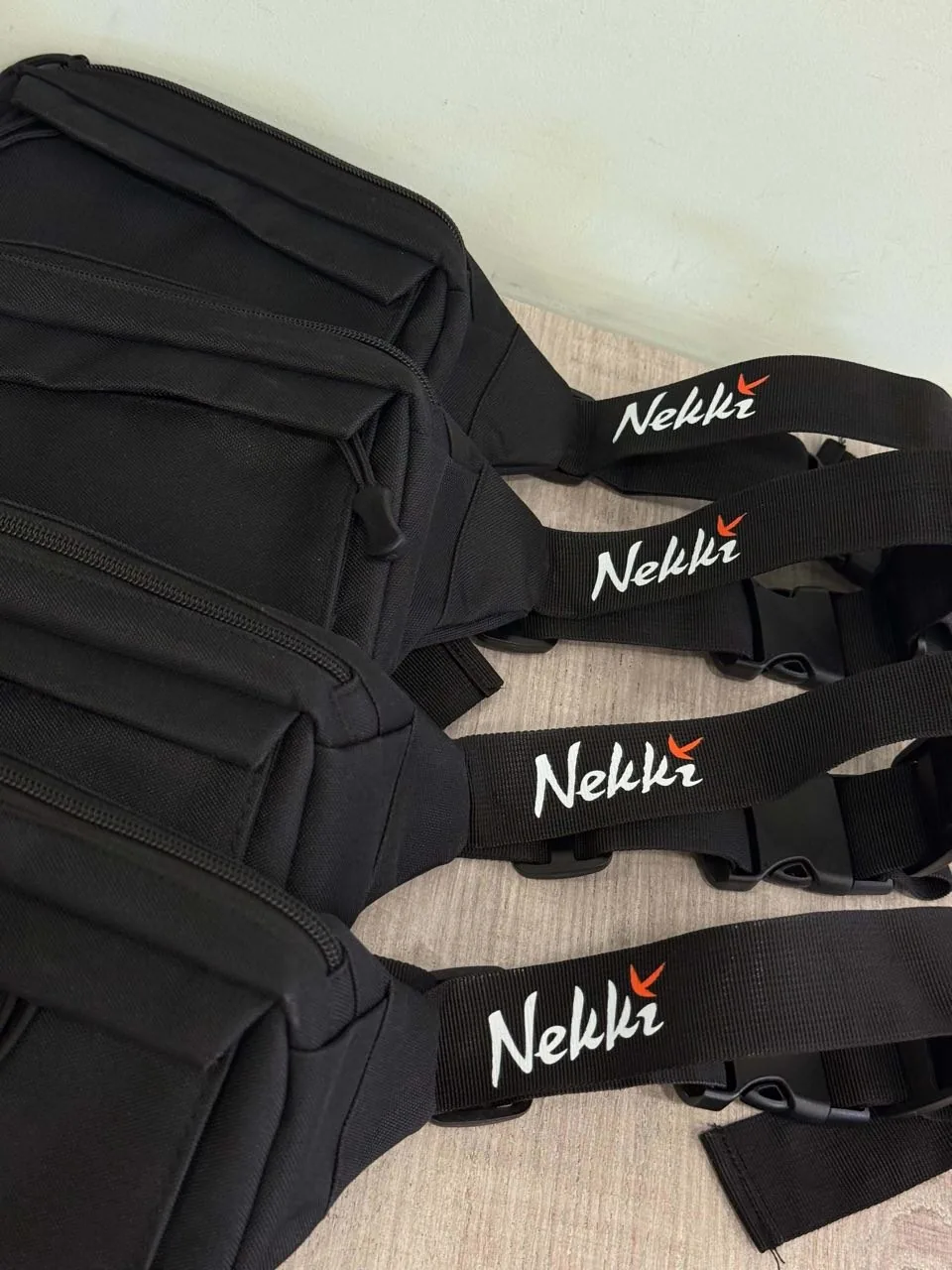 Black Nekki belt bags with branded straps
