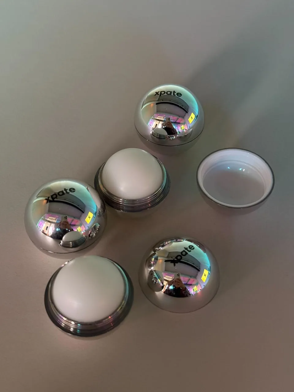 Open silver xpate lip balm cases